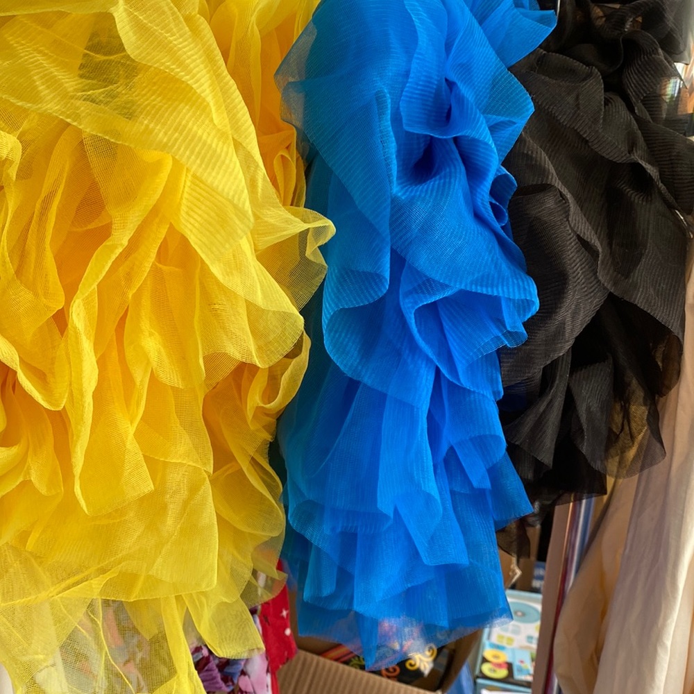 NWT tu-tus yellow, blue and black. Junior size from Wet Seal